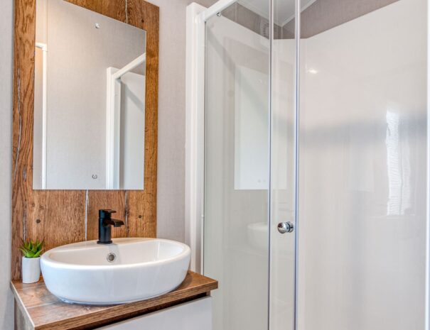 A modern toilet and shower room .