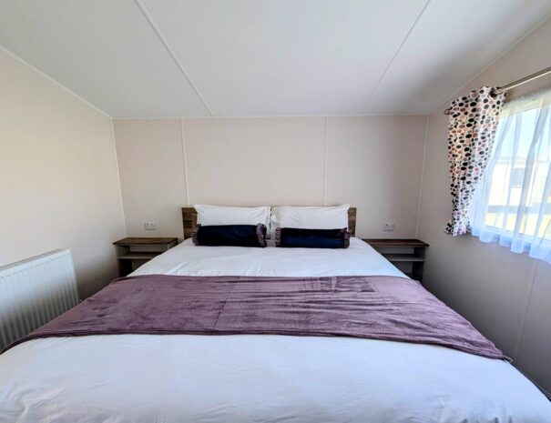 Master bedroom with walk in wardrobe.
